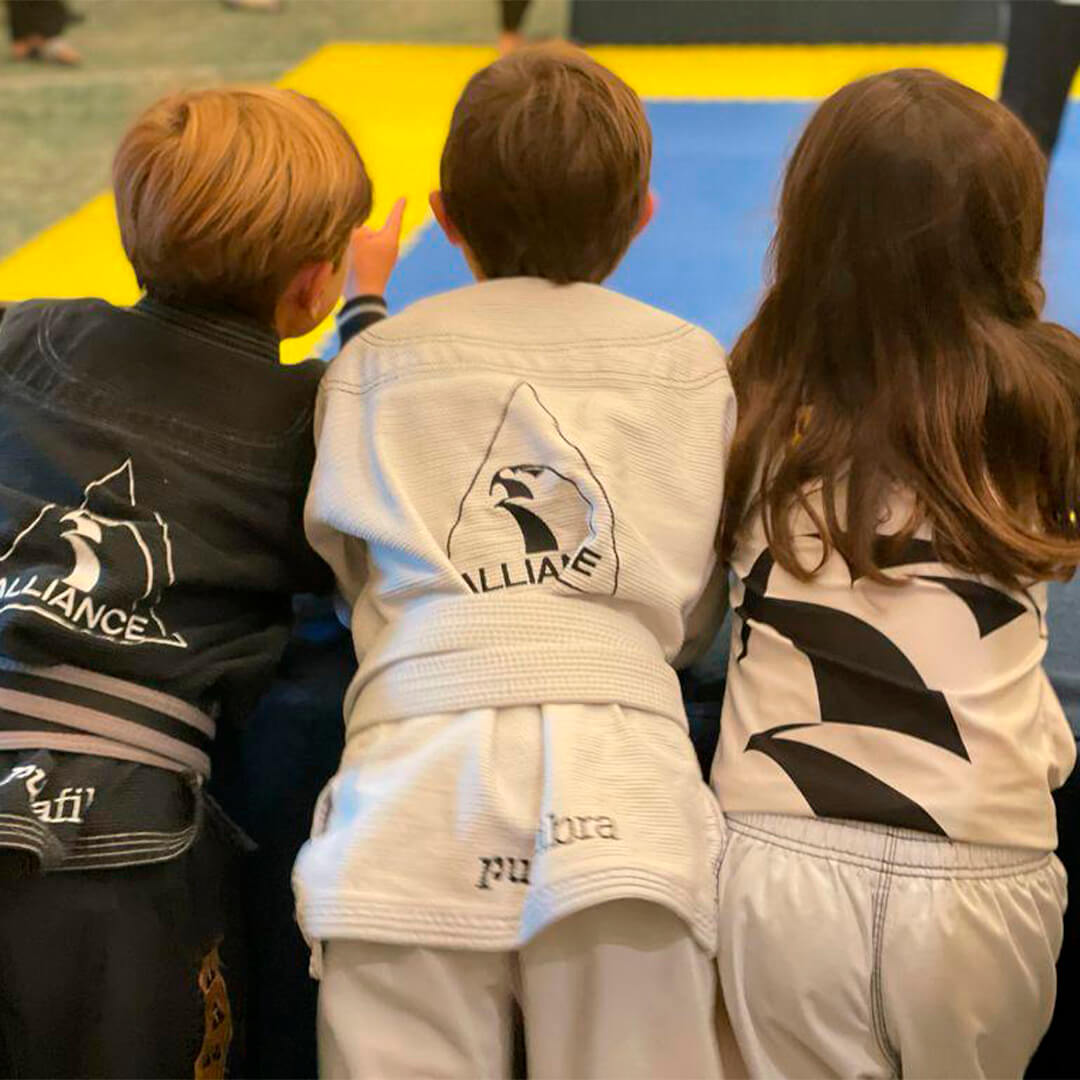 Kids lined up in gis before training