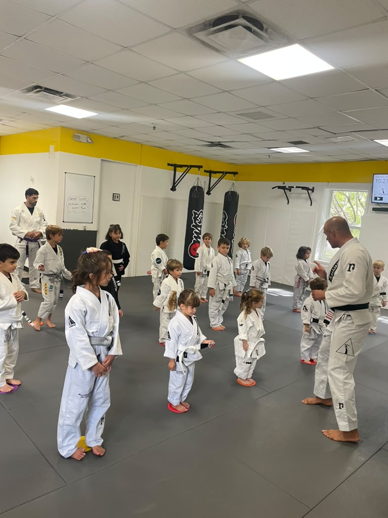 Instructor teaching a kids Jiu-Jitsu class at Alliance Key Biscayne